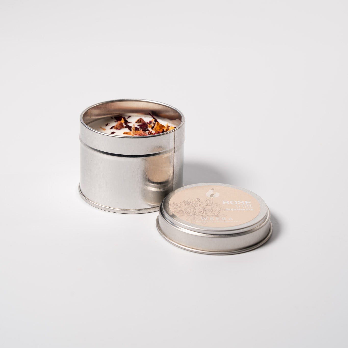 Schöne Kerze mit getrockneter Rose von WeFra-Candles, handgefertigt, detailreiche Blume auf warmem Kerzengel zu Dekorationszwecken